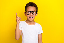 Photo Of Cute Boy Raise Arm Hand Wear Stylish Outfit Spectacles Find Solution Problem Answer Question Isolated On Yellow Color Background