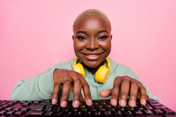 photo of pretty girl freelancer programmer coding making new software program isolated on pink color