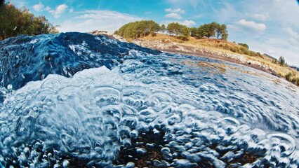 Wall Mural - Rapid river split. Splitted view of the clean rapid river flowing in Brazilian mountains