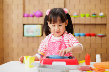 Sticker - young girl pretend playing food preparing at home