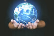 © Kenstocker - People hand holding Earth in concept of Earth day and Energy saving, Save Earth.