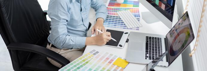 Professional development programmers are choosing color schemes to decorate their website or application to be attractive, Write information or code for the website,  HTML, Javascript, Color tone.