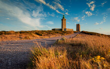 Landscape With A Road Leading To The Lighthouse, Sunset Light. Cap Frehel, Brittany - North France.