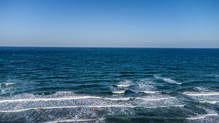 Wall Mural - Aerial view to tropical sandy beach and blue ocean stock photo