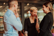 © .shock - Photo of a business team of young people discussing business ideas in a modern urban environment. Selective focus