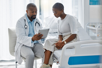 Doctor consulting patient with digital tablet, discussing diagnosis and medical checkup in hospital. Healthcare worker and trusted physician in appointment with medicine advice, wellness and feedback