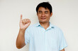 © Sanhanat - Asian man deaf teacher demonstrates body sign language on white background. Concept : Sign Language to teach or communicate with deaf disabled. Education for handicaps . 'I' letter.
