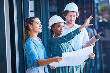 Poster - Building construction management team with an architect and engineering blueprint. Teamwork development collaboration of industrial engineer group planning a architecture renovation project