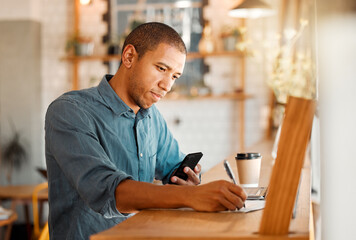 Poster - Serious, casual man entrepreneur working in restaurant cafe, calculating inventory and budget expense. Young male manager busy planning finance, accounting, tax report of his coffee shop startup