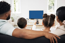Blue Screen, Chroma Key Tv With A Relax Family Watching And Enjoy Streaming Movies, Series And Entertainment Copy Space. Back View Of Parents And Kids Spending Leisure Time Viewing Television