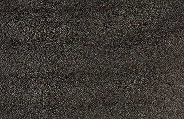 background of soft black polyester fabric with wet asphalt texture