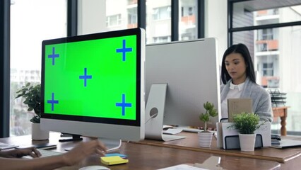 green screen, mockup and tracking markers with business people at work on computer . women workers a