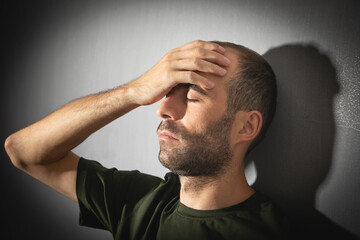 Wall Mural - Caucasian stressed man at home.