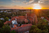 Fototapeta Bambus - The Roman Catholic Diocese of Pelplin at sunset, Poland