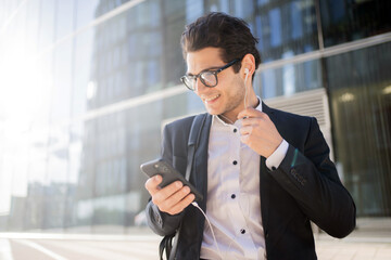 Wall Mural - The phone rings a man manager employee in a financial company, goes to the office in a business suit building a career