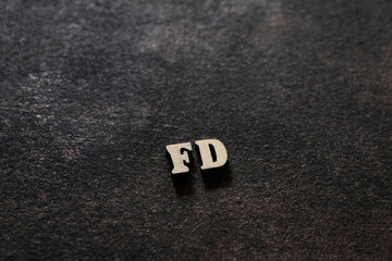Wall Mural - The letters F and D above the dark field. Initials FD