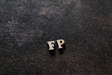Wall Mural - The letters F and P above the dark field. Initials FP
