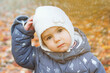 © Nadezhda Zaitceva - Portrait of little Caucasian girl on background of autumn leaves.