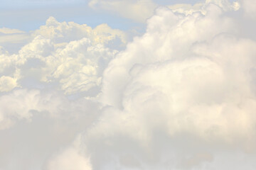 Wall Mural - Cloud in sky atmosphere from airplane, out of windows is cloudscape cumulus heaven and sky under Sun. View from above cloud is beautiful with abstract background climate weather at high level