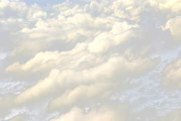 Wall Mural - Cloud in sky atmosphere from airplane, out of windows is cloudscape cumulus heaven and sky under Sun. View from above cloud is beautiful with abstract background climate weather at high level