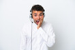 © luismolinero - Telemarketer Brazilian man working with a headset isolated on white background with surprise and shocked facial expression