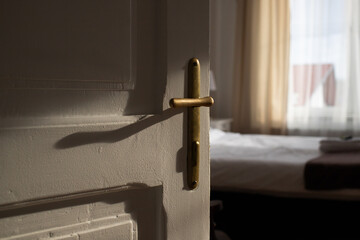 Canvas Print - vintage white door opening into bedroom