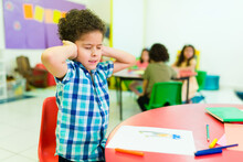 Overwhelmed Preschooler With Autism In Kindergarten