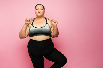 Wall Mural - Sporty obese ready for her cardio workout to lose weight