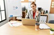 © Krakenimages.com - Young woman business worker using laptop working at office