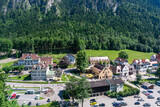 Fototapeta Lawenda - A small village under a blue sky in Munich, Germany