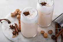 Iced Chai Latte With Warm Winter Spices Topped With Milk Foam