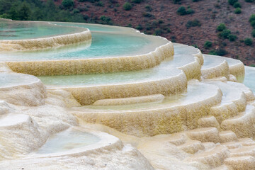 The  beautiful travertine landscape in Baishui Platform scenic spot in Diqing Tibetan Autonomous Prefecture Yunnan province, China.