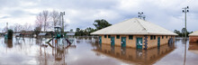 Flooded Park And Playing Field With Amenities Building Underwater