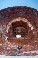 Wall Mural - Close up window view as frame of Remnants of the fortress ruins at Onrust Island, Thousand Island, Jakarta