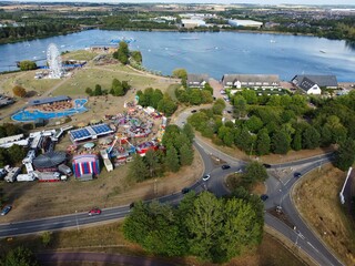 Aerial View of Caldecotte Lake at Sunset, A beautiful lake split across 2 sides, drone's high angle footage of People and Landscape of England UK