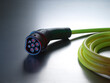 © Westend61 - Electric vehicle charging cable on table