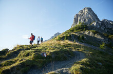 Hikers Descending From Mountain In Front Of Clear Sky, Mutters, Tyrol, Austria