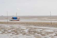 Germany, Schleswig-Holstein, Pellworm, Fishing Boat At Low Tide