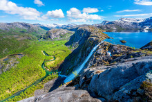 Norway, Nordland, Scenic View Of Lake Litlverivatnet And Litlverivassfossen Waterfall