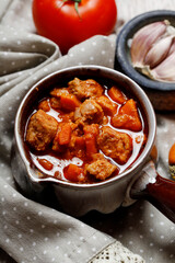 Sticker - A bowl of traditional goulash.