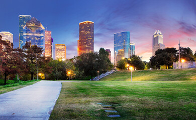 Wall Mural - Houston Texas Skyline with modern skyscrapers and blue sky view from park river US