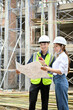 © bongkarn - Portrait, Professional male engineer and female architect in the construction site