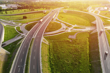 Aerial view of cars driving on round intersection in city, Transportation roundabout infrastructure, Highway road junction in Wroclaw, Poland