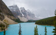  Lake moraine during a cold snowy day in Autumn in Canada, Beautiful turquoise waters of the Moraine lake with snow. Banff National Park of Canada Canadian Rockies