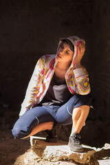 Wall Mural - Young female hip hop dancer dancing in abandoned building on a sunny summer day	
