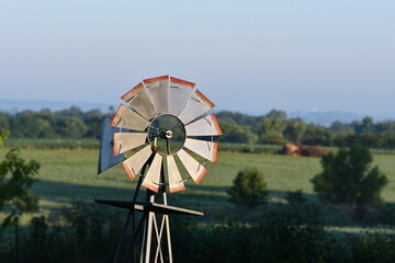 Canvas Print - Windmill in a Farm Field