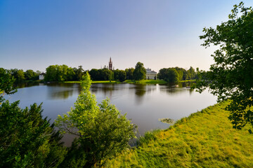 Naklejka na meble Scenic landscape panorama in “Gartenreich Dessau-Woerlitz“ Germany on sunny summer evening in warm sunlight is a public Unseco World Heritage site in Saxony-Anhalt Germany on the river Elbe.