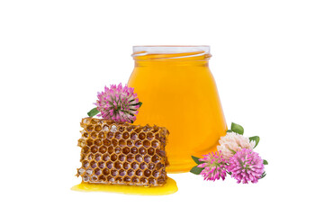 Wall Mural - isolate jar with honey and piece of beeswax and clover flower