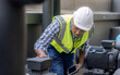 © Basicdog - Engineer inspects a large industrial centrifugal pump.