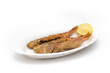 Fried red mullet, on a plate, isolated on white background. Spanish food concept.